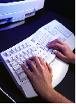 Photo of hands on keyboard